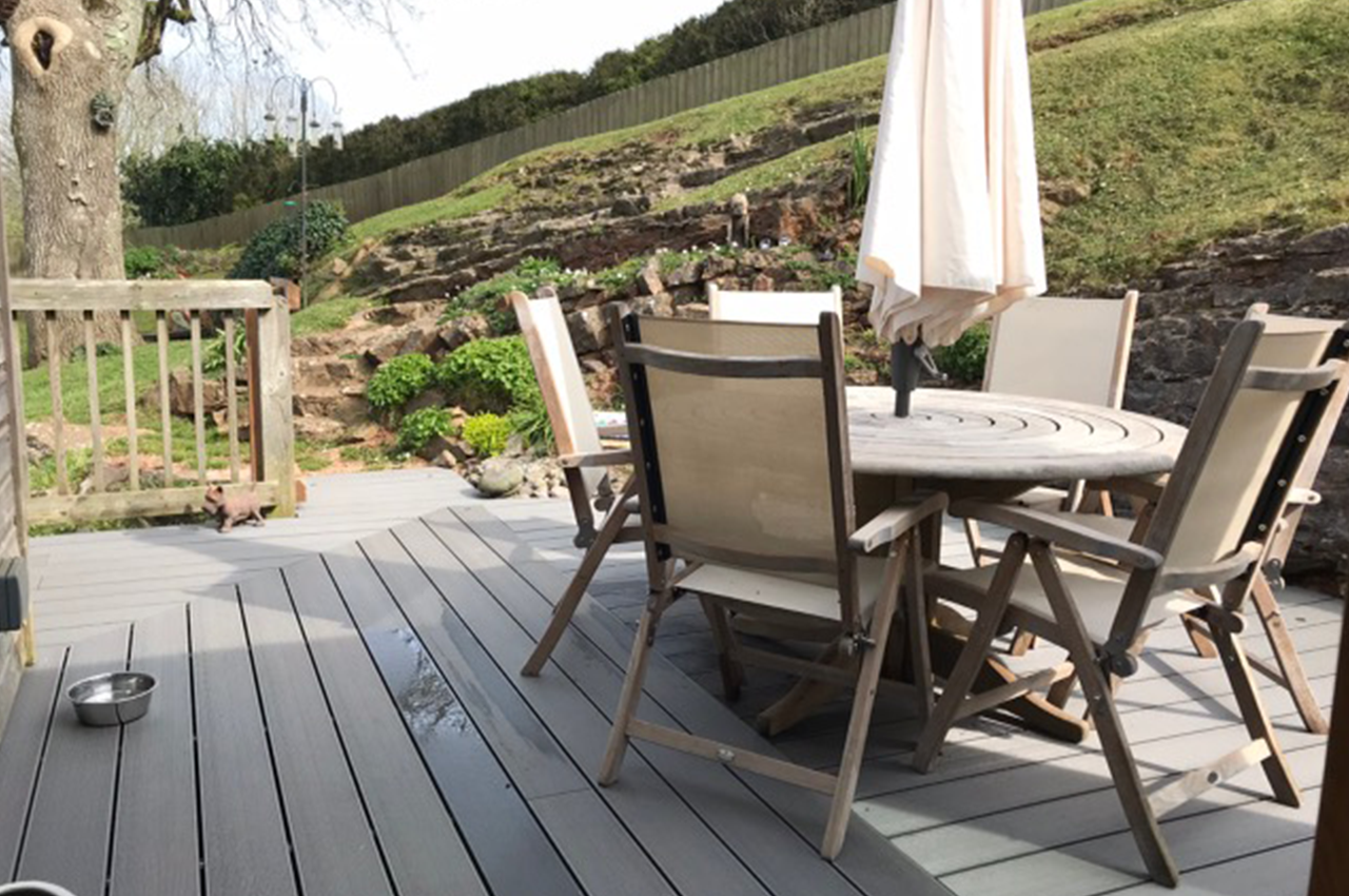 Stone Grey Decking against natural stone