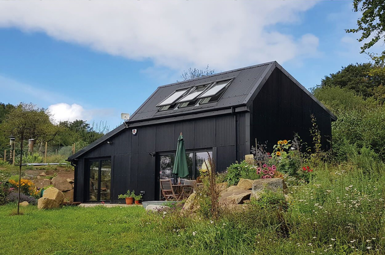 Cladco Corrugated Roofing Sheets In Black Give This Build Both Symmetry and Beauty