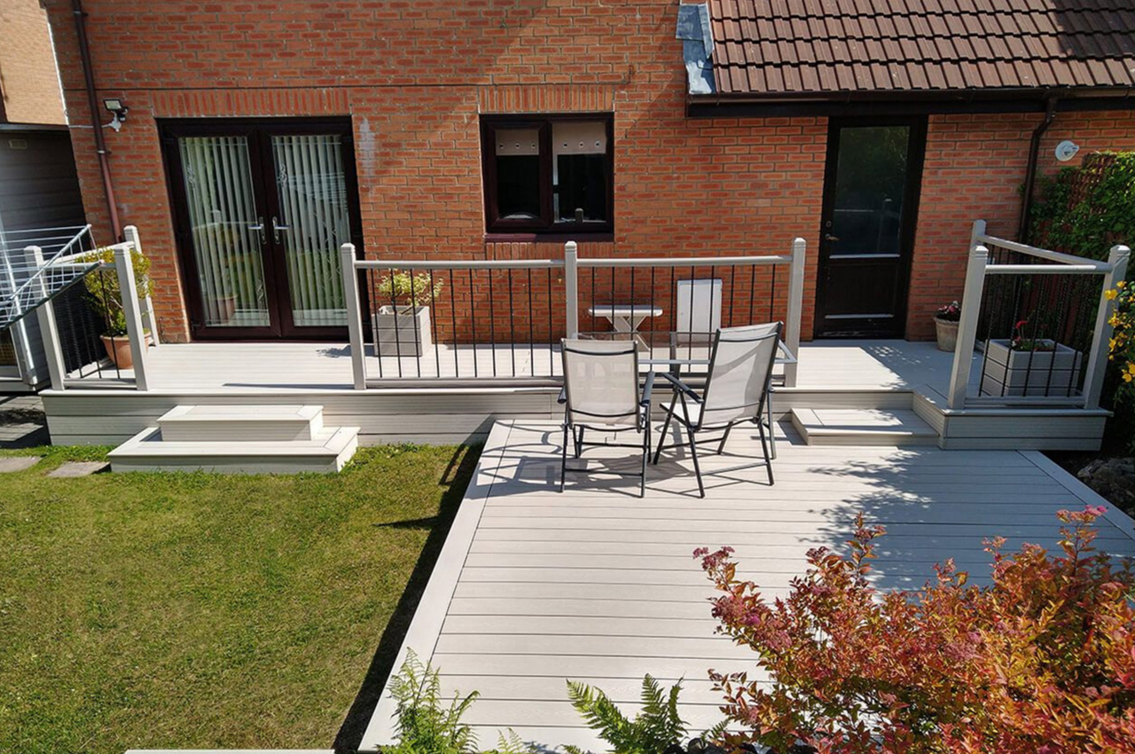Cladco Composite Decking in Ivory gives this garden a unique and sophisticated look