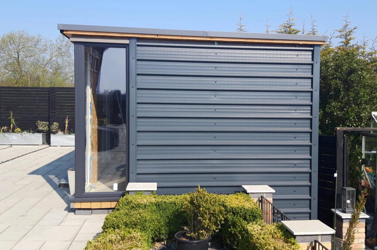 A modern garden building has been designed using 32/1000 Box Profile Roofing Sheets as side cladding