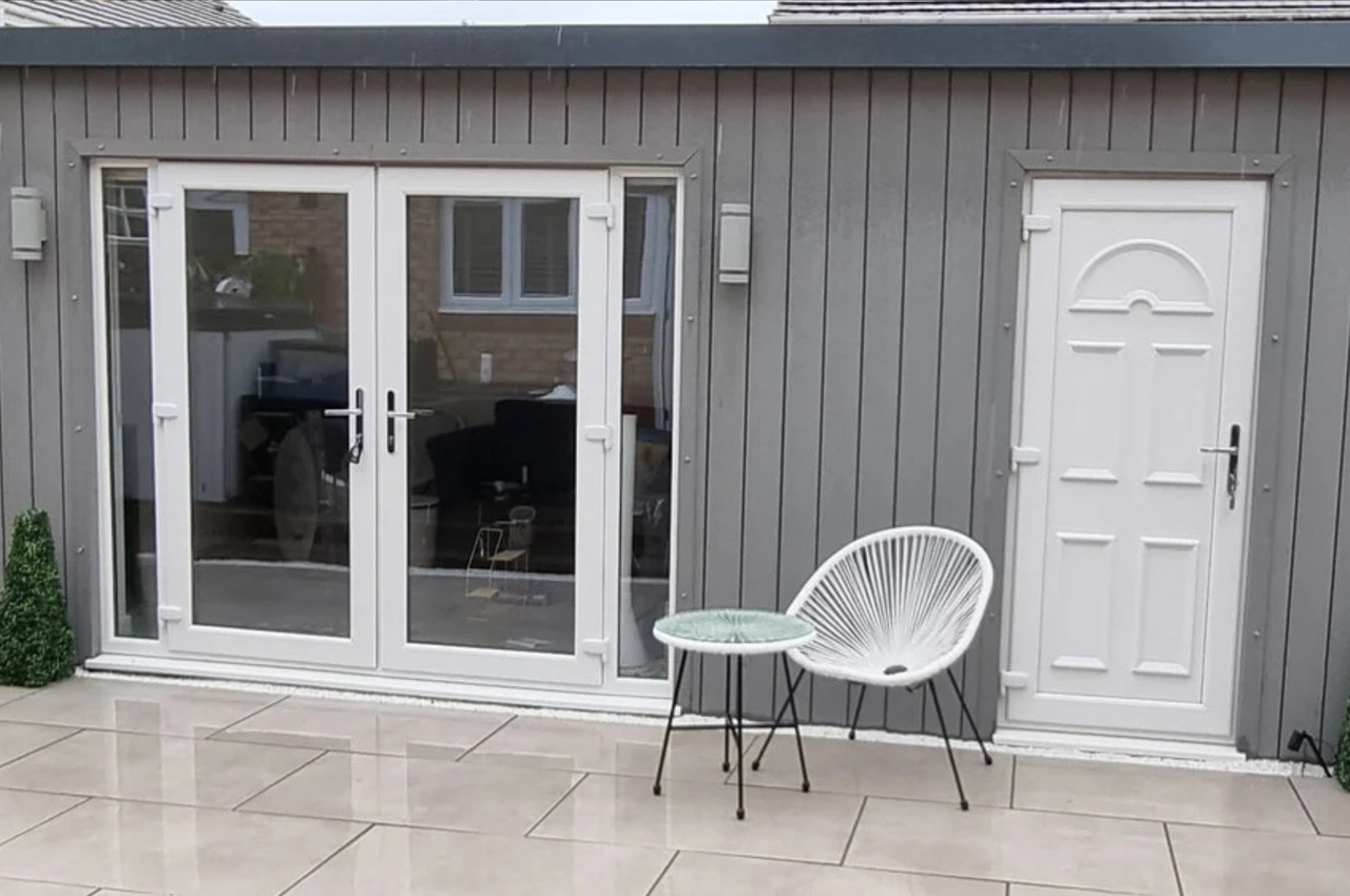 Cladco Composite Stone Grey Wall Cladding gives this outdoor garden room a unique and stylish exterior.