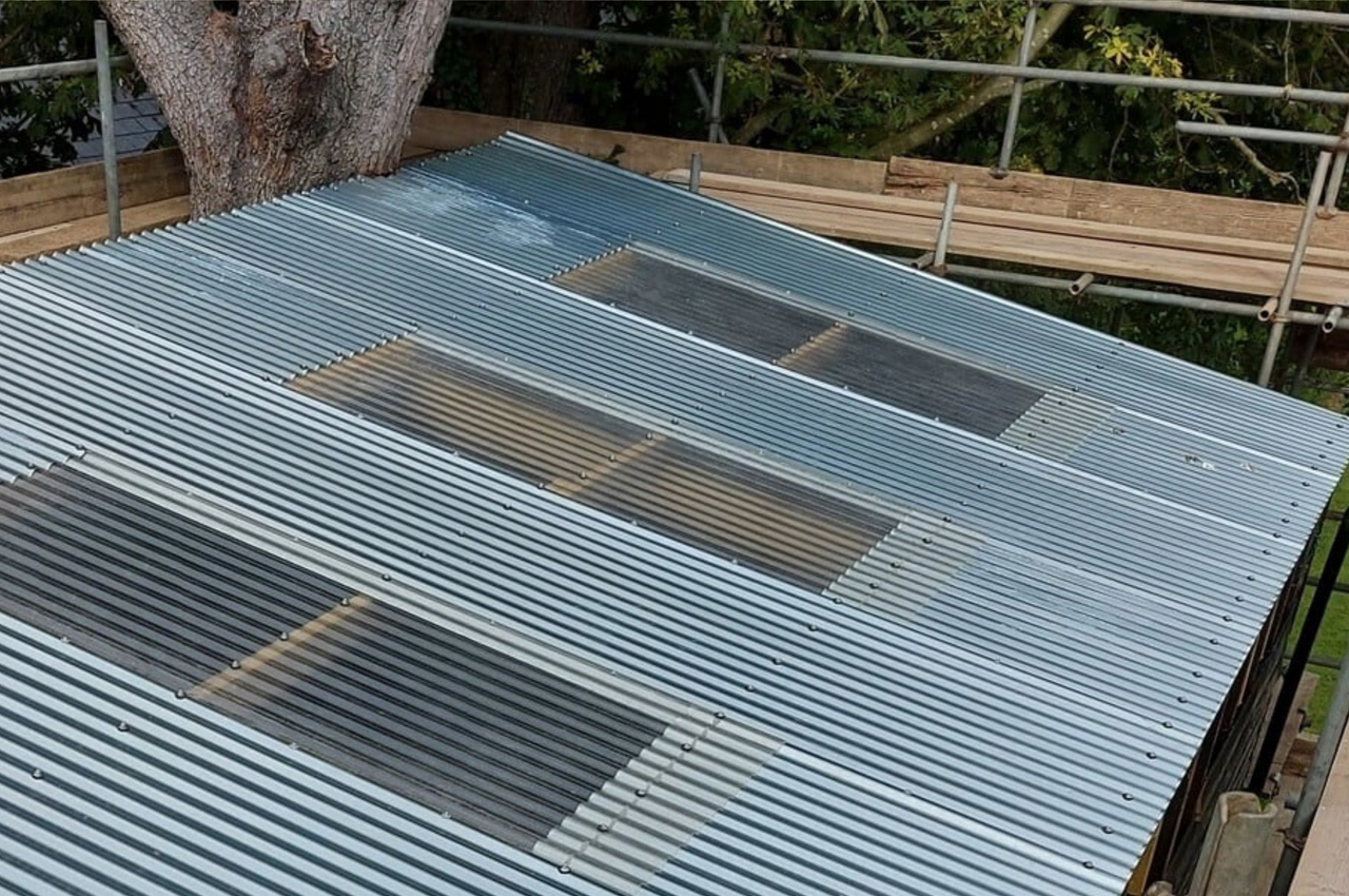 Roof Lights and Corrugated Roofing Sheets have transformed the look and practicality of the roof of this barn