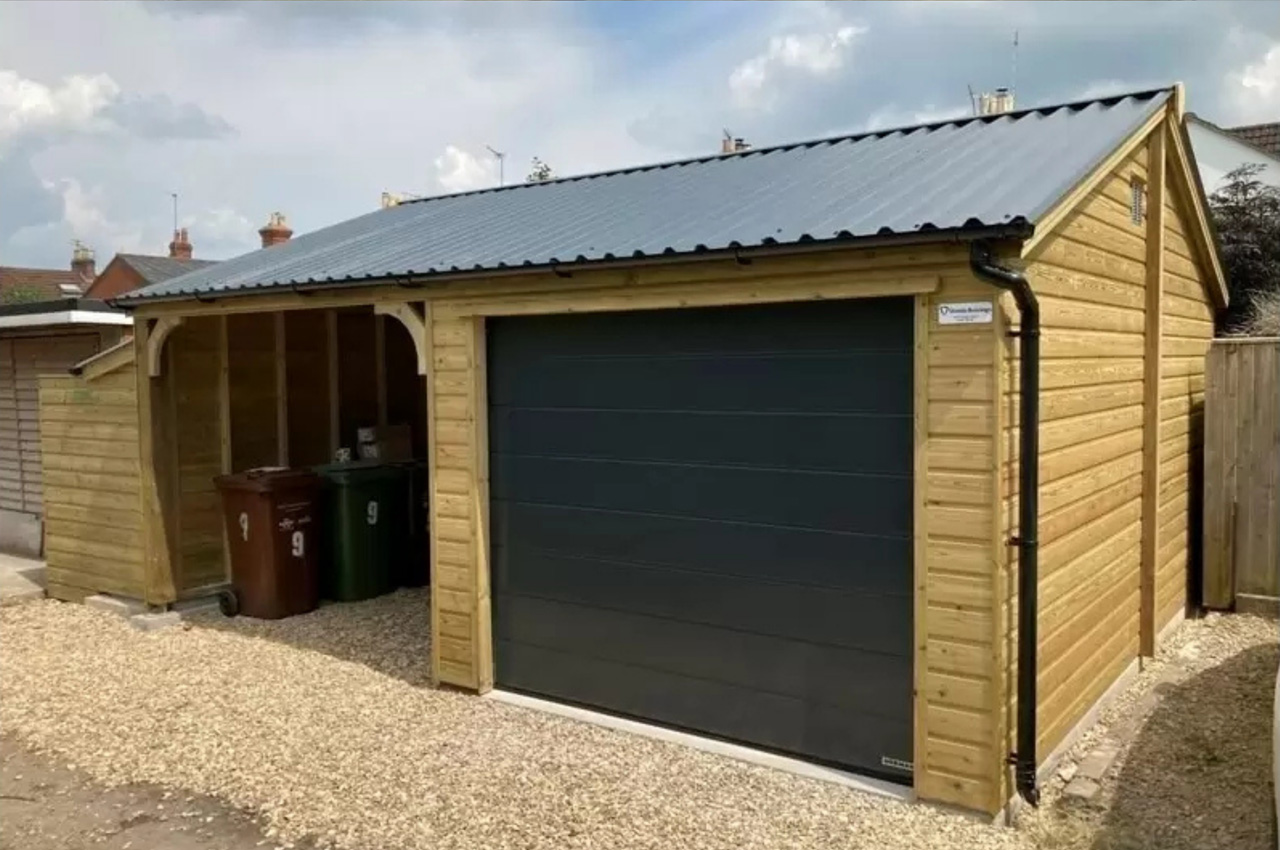 Cladco 34/1000 Box Profile Roofing Sheets protect this garage carport building