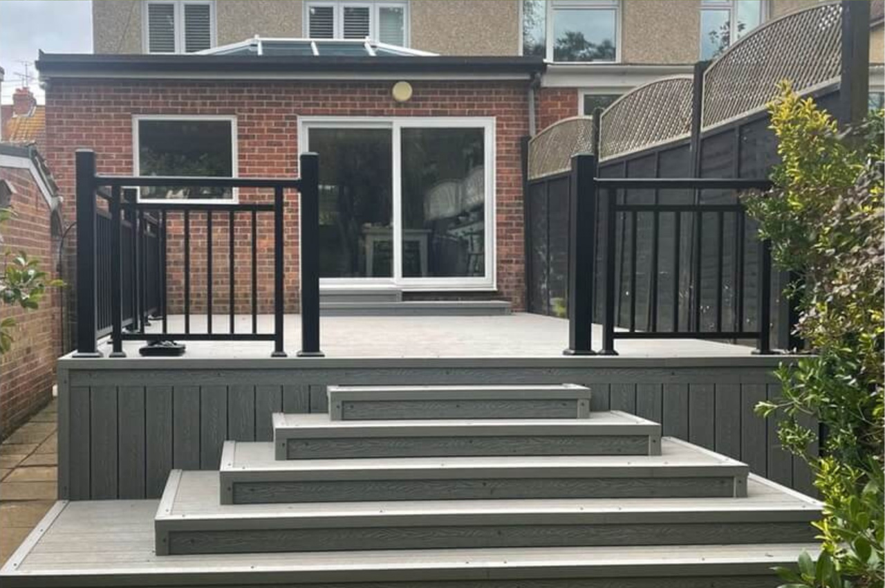Old, rotten timber boards replaced by Stone Grey Woodgrain Composite Decking and Powder-Coated Aluminium Balustrade Handrails