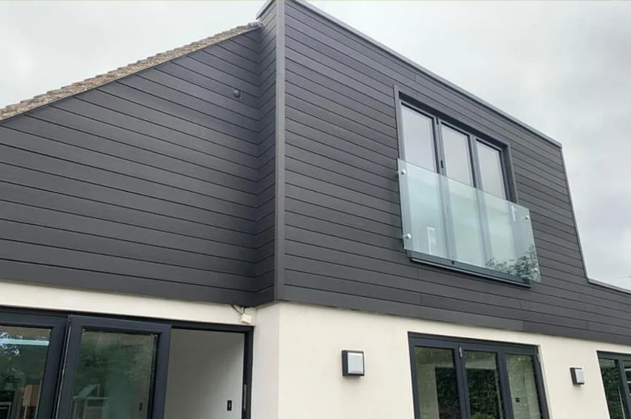 A large extension designed with Cladco Composite Wall Cladding Boards in Charcoal