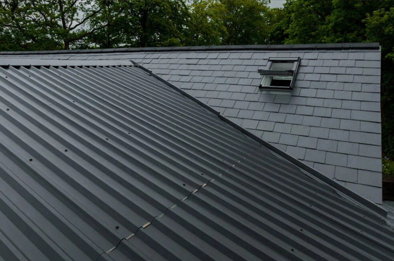 Cladco 32/1000 Box Profile Roofing Sheets in Black protect this modern self-build home, The Spinney