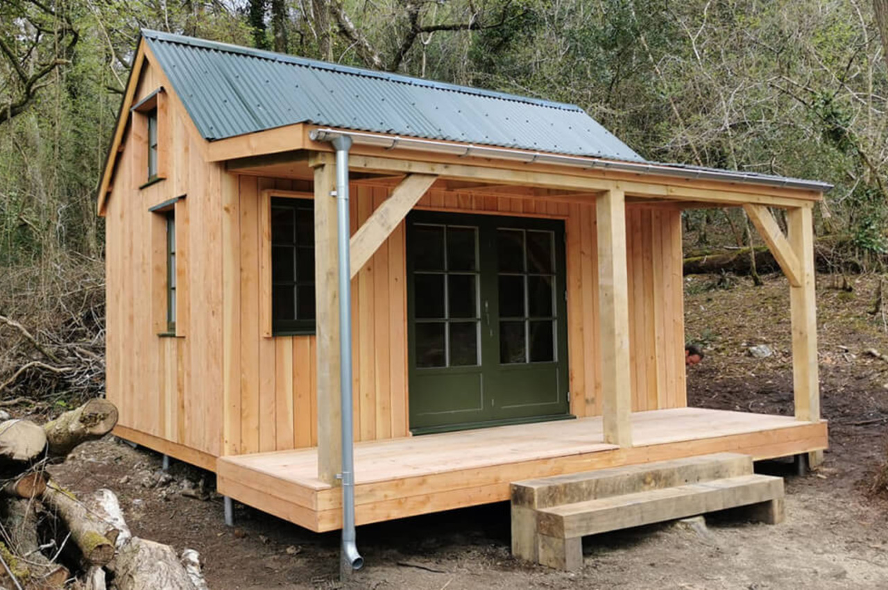 Off-grid woodland cabin featuring Cladco Corrugated Roof Sheets