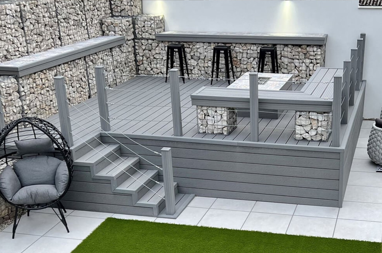 Stone Grey Woodgrain Effect Decking and Fencing Posts create a raised deck
