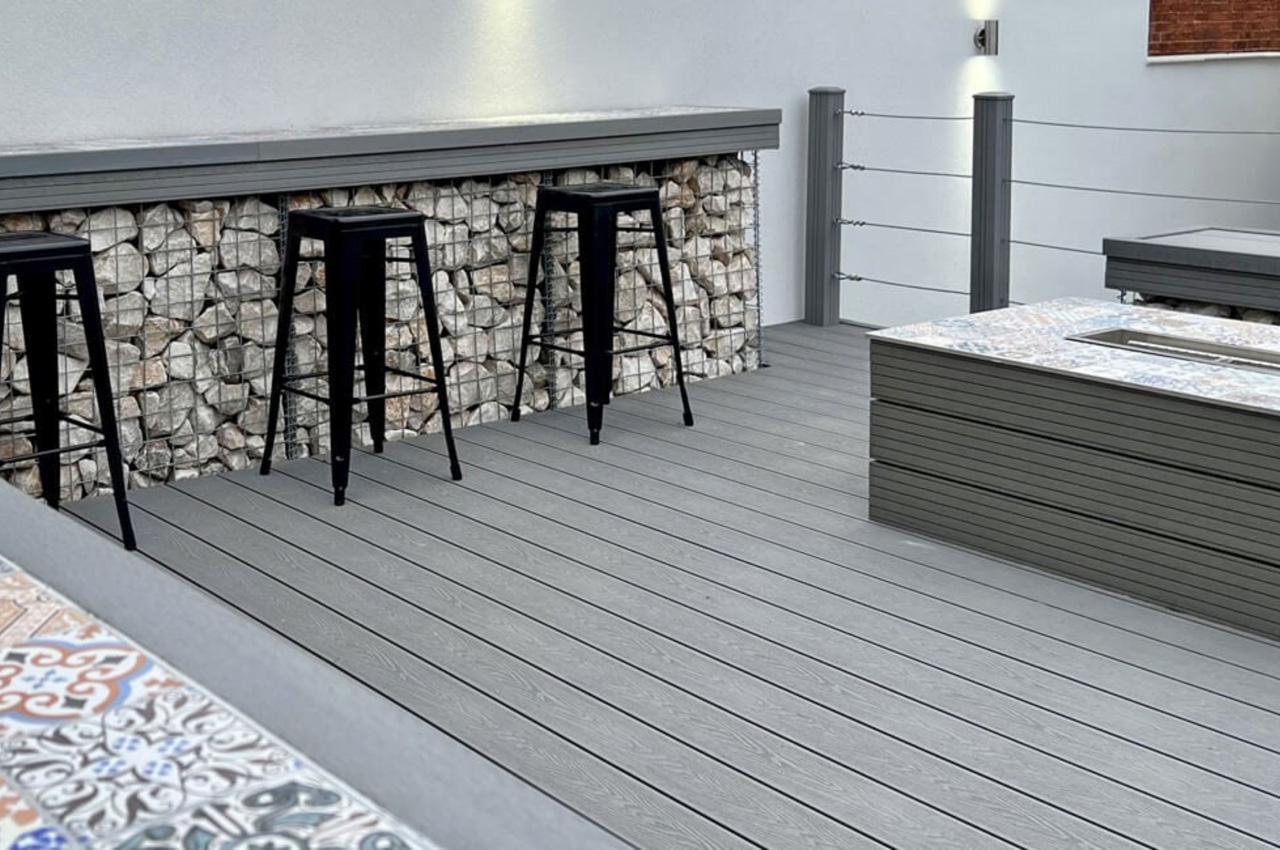 Stone Grey Woodgrain Effect Decking and Fencing Posts create a raised deck