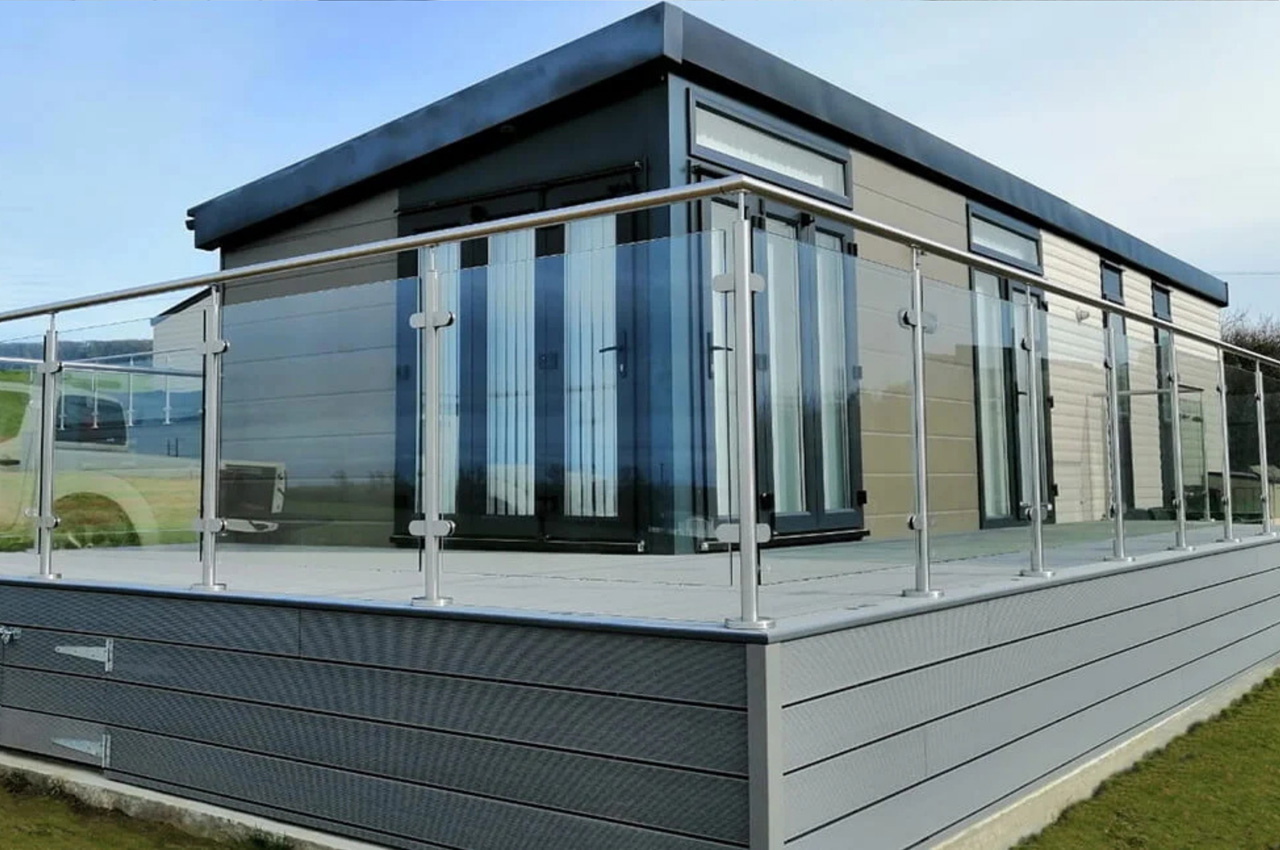 Cladco Composite Decking terrace area with stainless steel and glass balustrades.