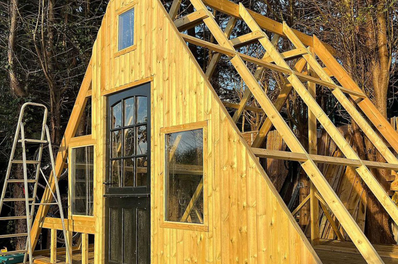 Self-build ski chalet featuring Cladco 32/1000 Box Profile Roof Sheets in Black