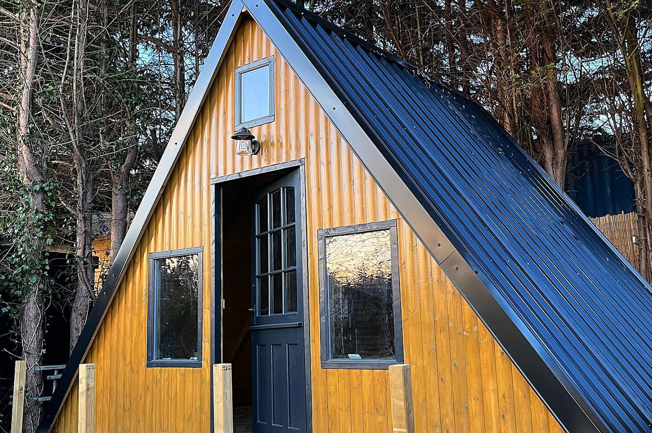Self-build ski chalet featuring Cladco 32/1000 Box Profile Roof Sheets in Black