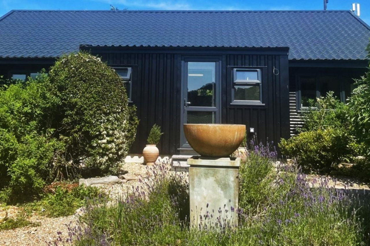 Nordic Night Black Tile Form Roofing on office | Cladco