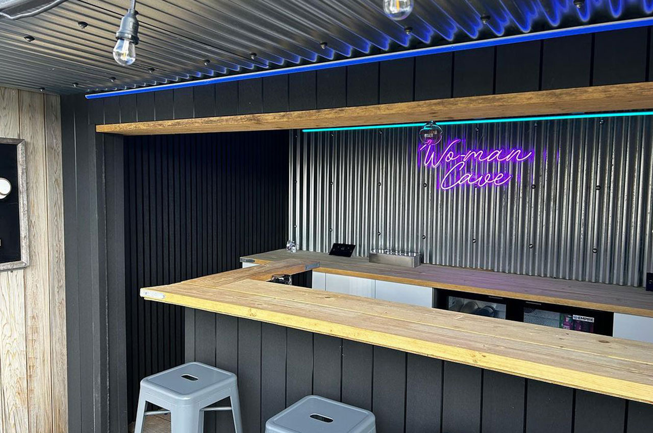 13/3 Corrugated Steel Cladding in Plain Galvanised are featured in this creative outdoor bar
