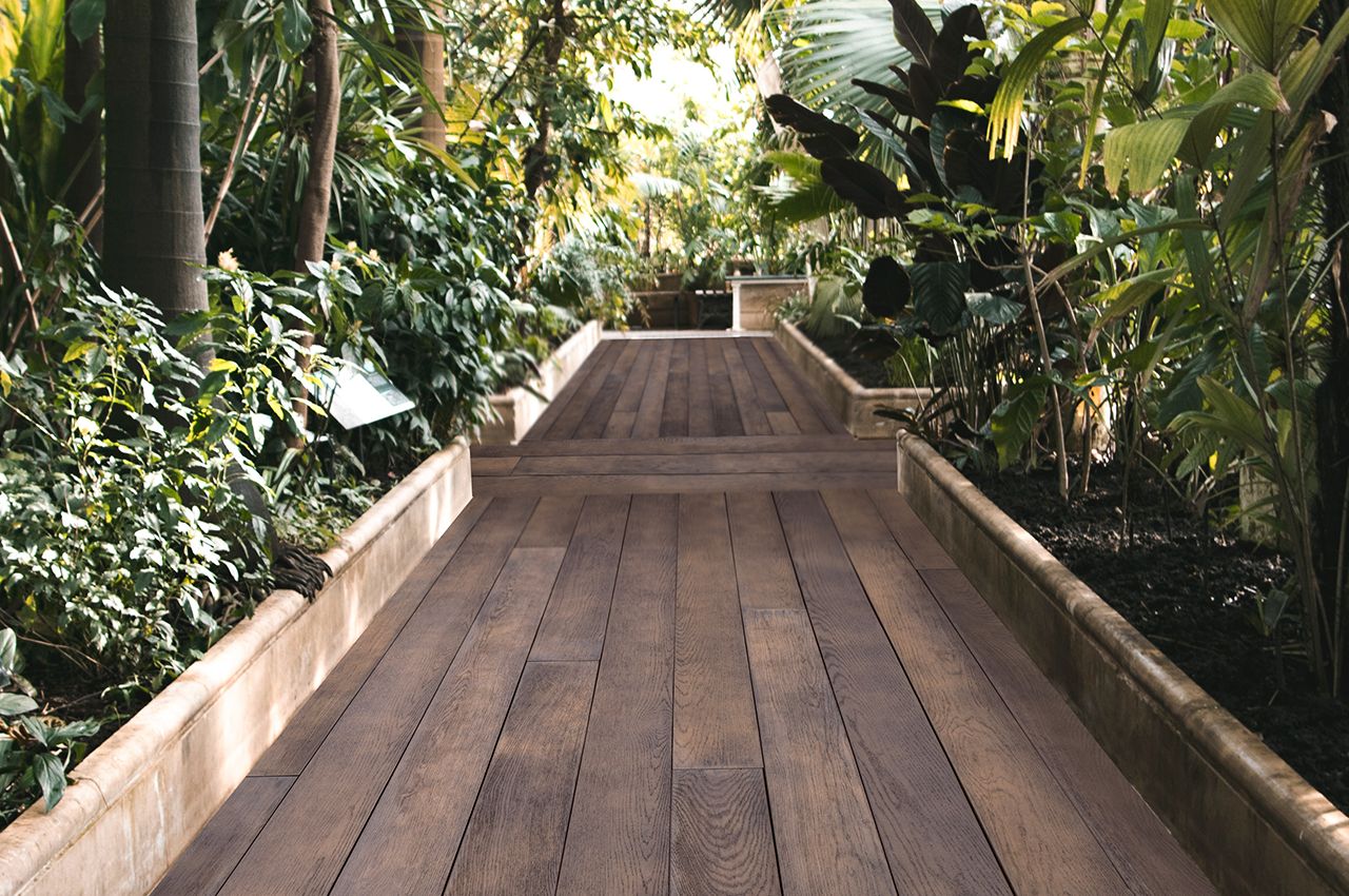Tropical Walkway | Millboard® Enhanced Grain Decking in Antique Oak