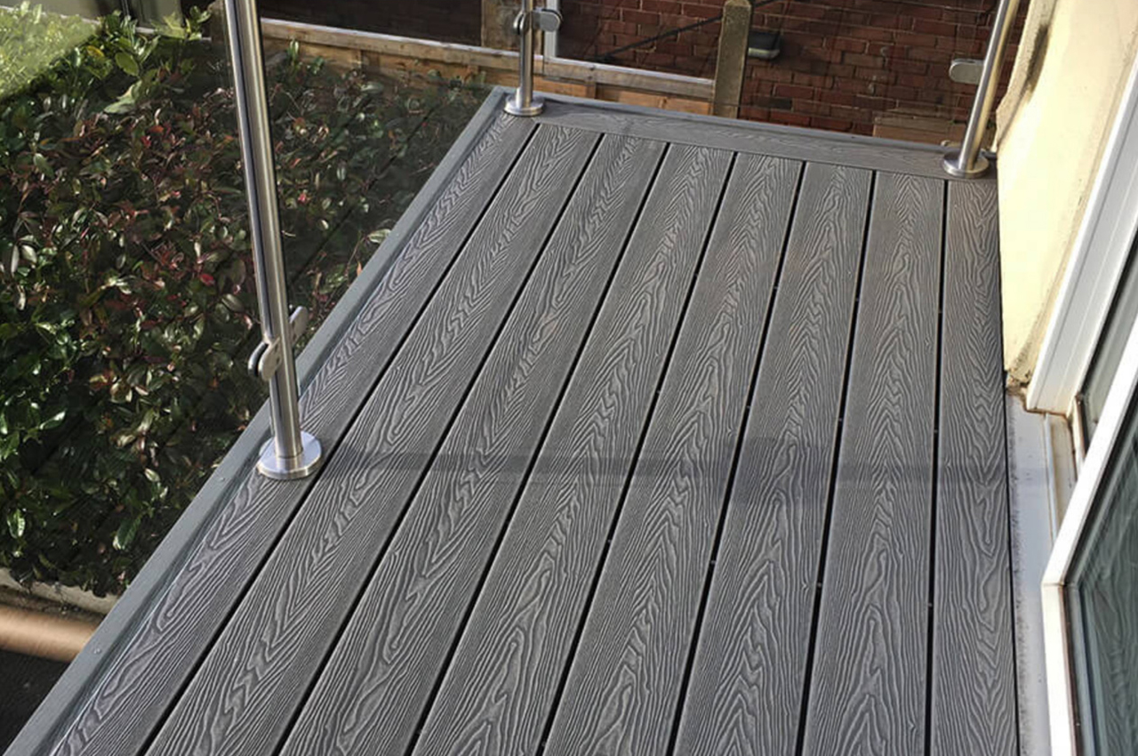 Cladco Woodgrain Decking Boards in Stone Grey complete this balcony