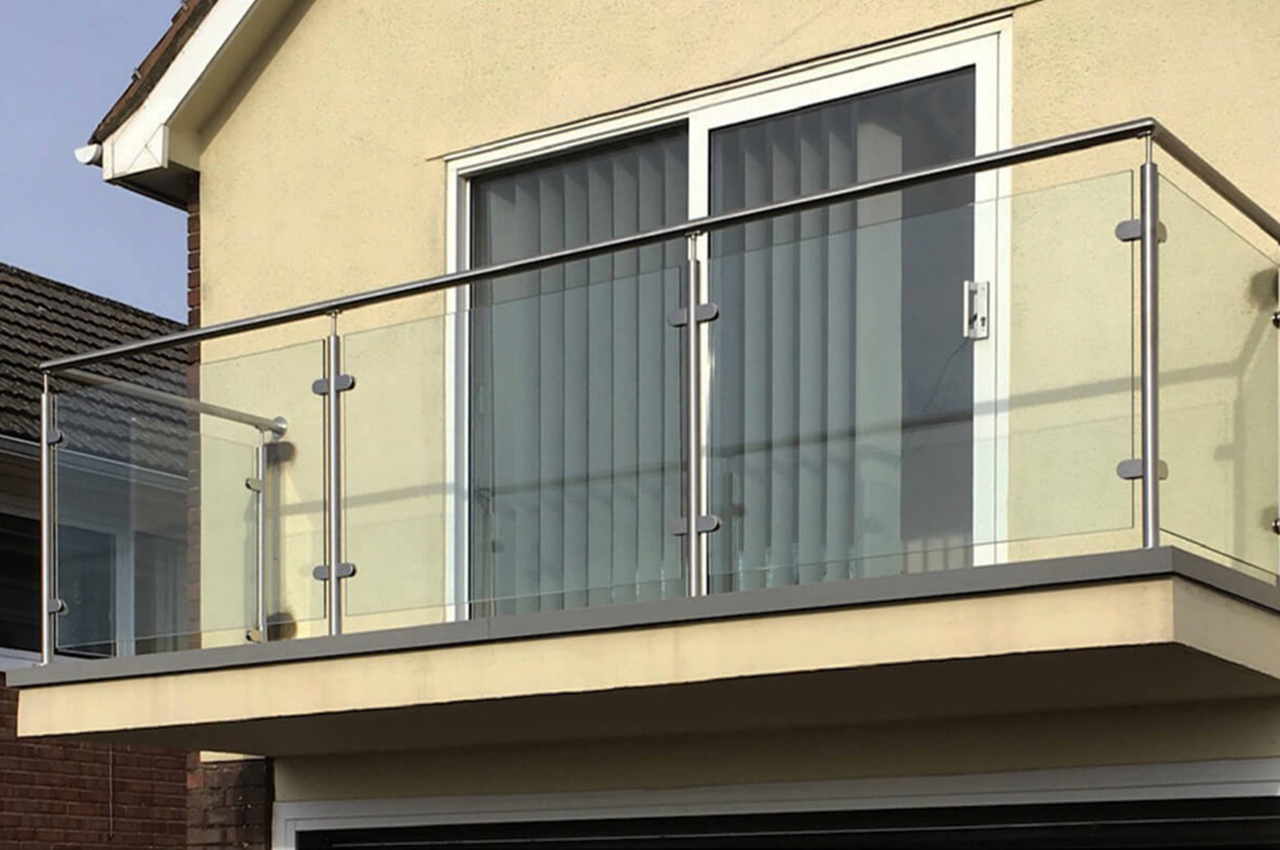 Cladco Woodgrain Decking Boards in Stone Grey complete this balcony 