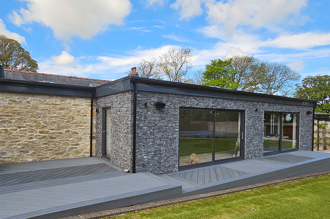 Trendy Natural Cabin | Millboard Board & Batten Cladding In Golden Oak