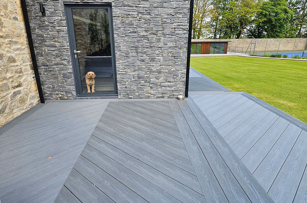 Trendy Natural Cabin | Millboard Board & Batten Cladding In Golden Oak