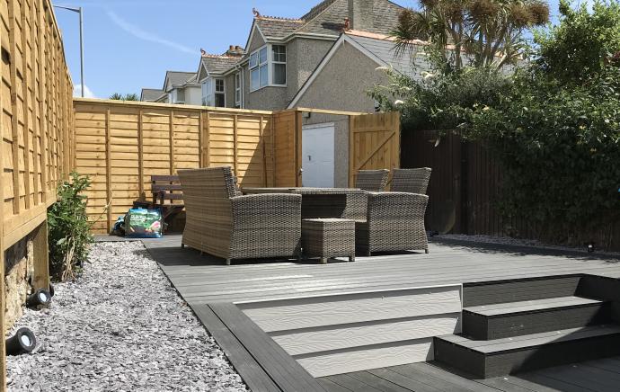 Modern Garden Transformation with Charcoal Composite Decking, Integrated Lighting & Steps
