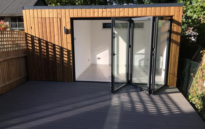 Bespoke Garden Room with Stone Grey Composite Decking by Ark Design Build