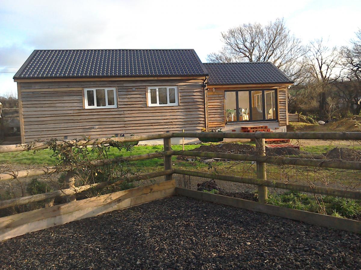 Traditional Barn Conversion Transformed with Tile Form Roofing Sheets