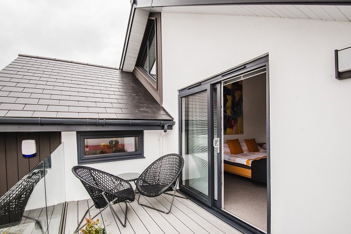 Modern Timber Frame Retirement Home with Grey Composite Decking in Penarth