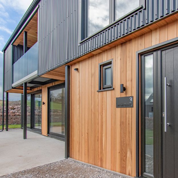 ​Modern Barn-Style Home with Black Corrugated Cladding & Roofing – Graham K Architects