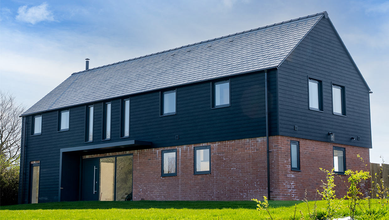 Modern home featuring Cladco Signature Composite Wall Cladding in Charcoal
