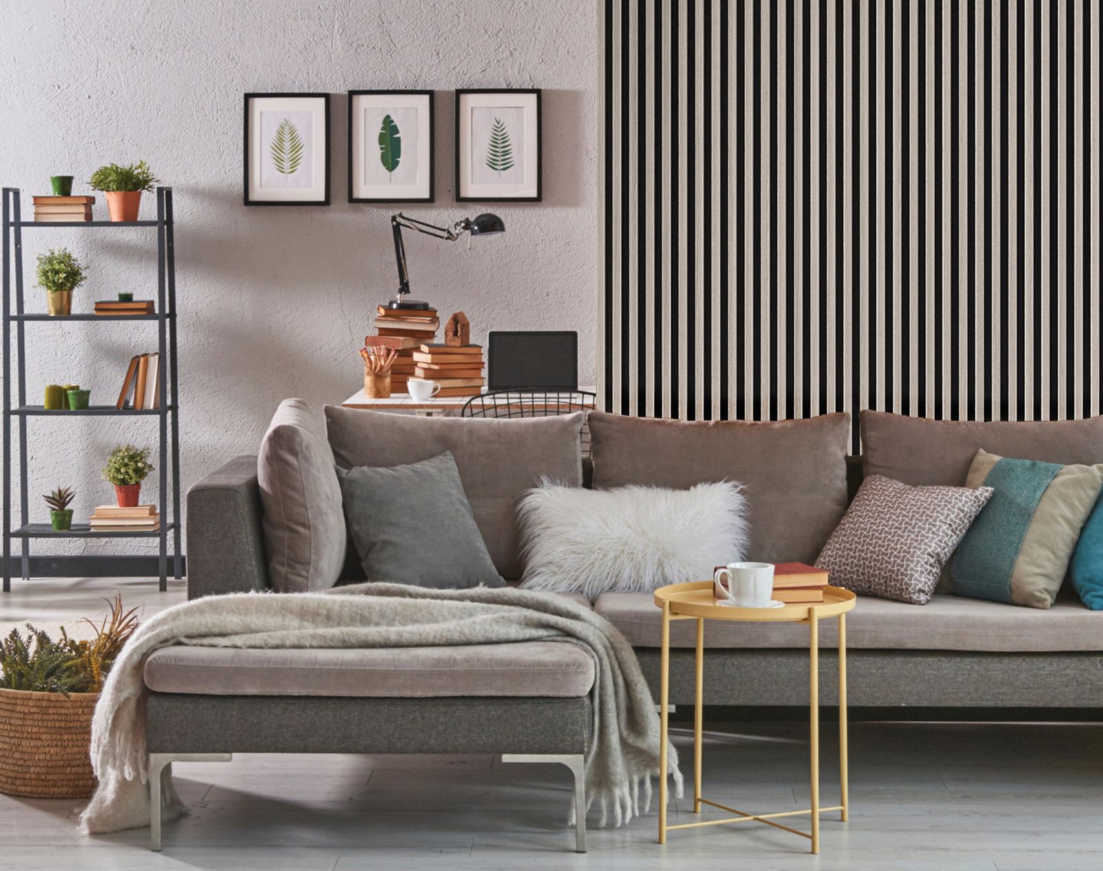 Modern living room with slatted wall panelling, grey corner sofa, minimalist shelving, and Scandinavian-style decor.