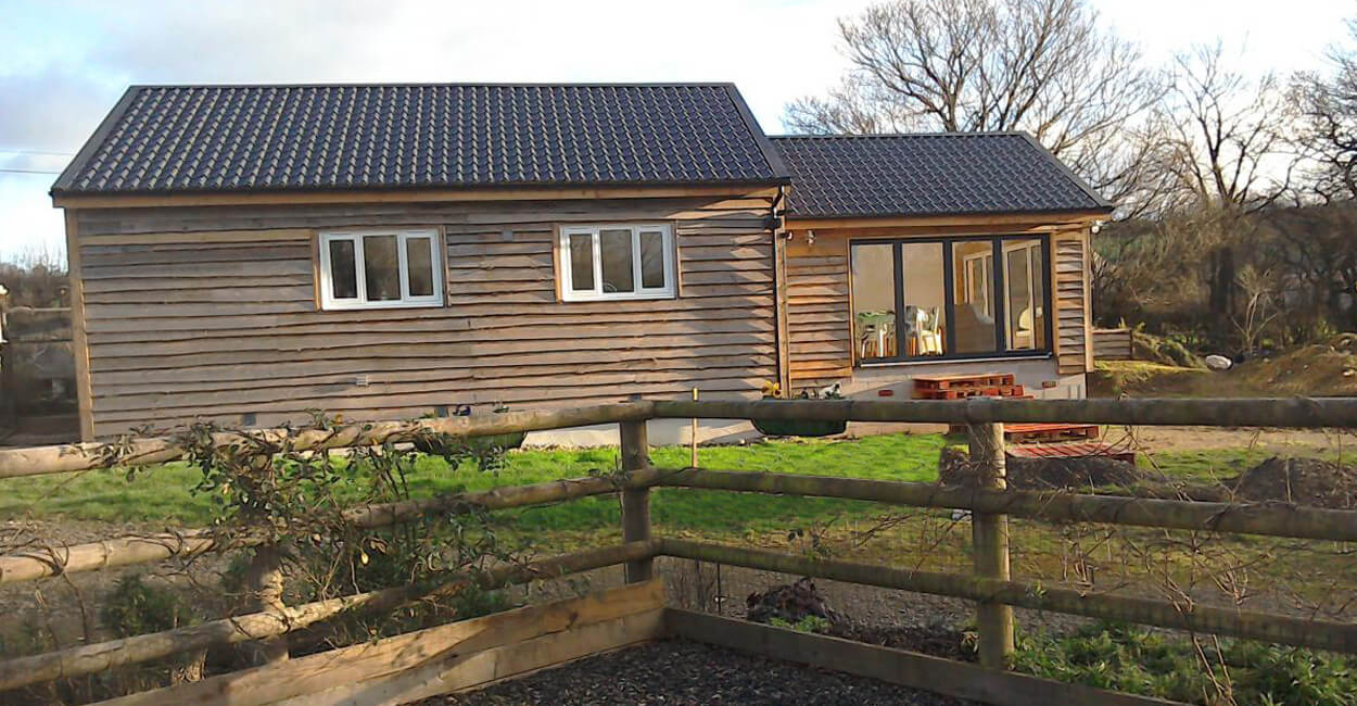 Barn conversion showcasing Cladco Tile Form Roofing Sheets