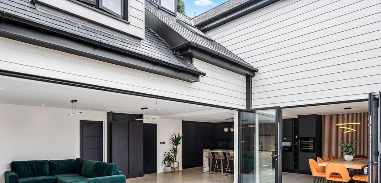 Cladco Fibre Cement Wall Cladding has been used on this stunning renovation, the Cream Boards work perfectly with the contrasting black windows and doors. Fibre Cement Cladding used to improve an outside seating area
