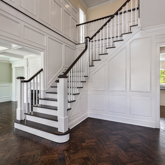 Shaker style wood wall panels installed in an entrace hall Shaker style wood wall panels installed in an entrace hall