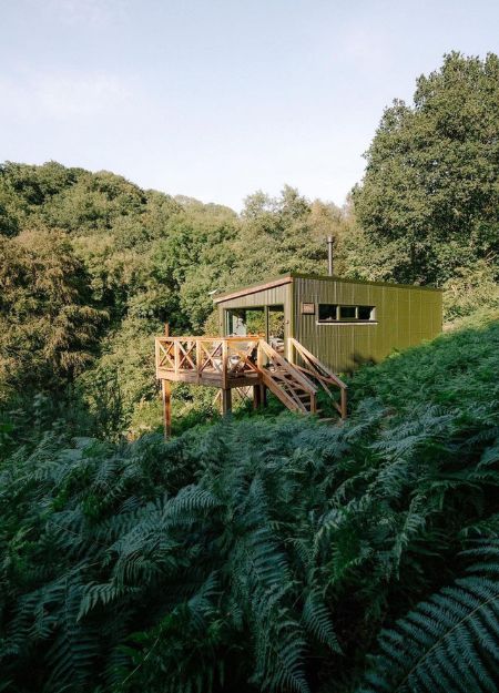 Eco-friendly cabin at Cove Valley with Cladco corrugated steel roofing and cladding, nestled in the Devon countryside