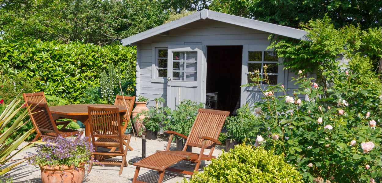 Grey painted wooden garden room summerhouse