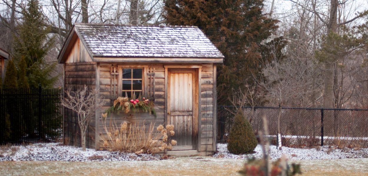 Wooden garden room with snow