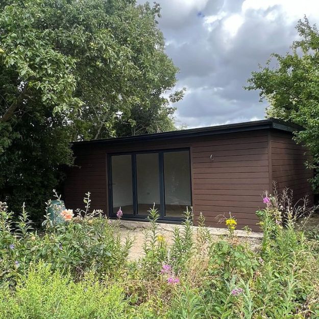 Cladco Composite Cladding in Coffee on garden room