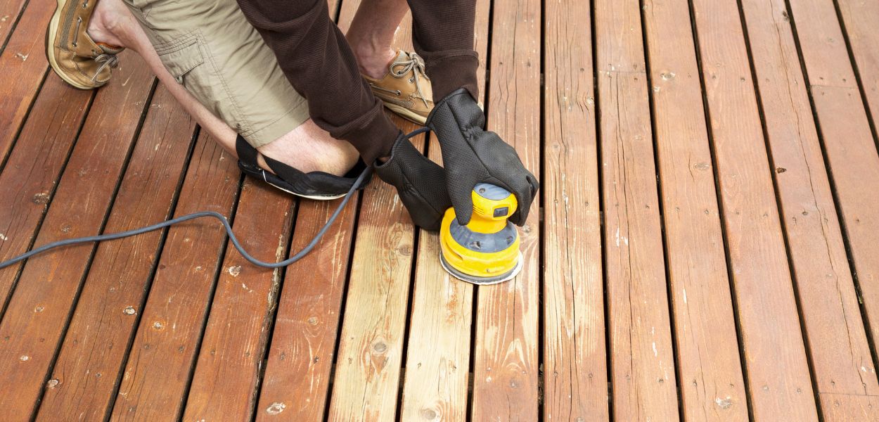 Sanding wooden decking