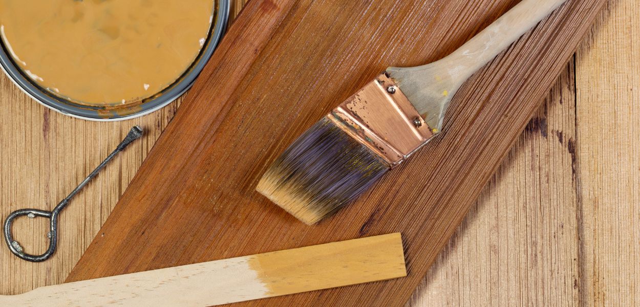 Staining wooden timber decking board