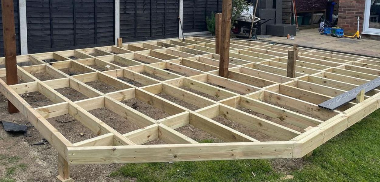 Cladco Stone Grey Composite Decking area with timber framing