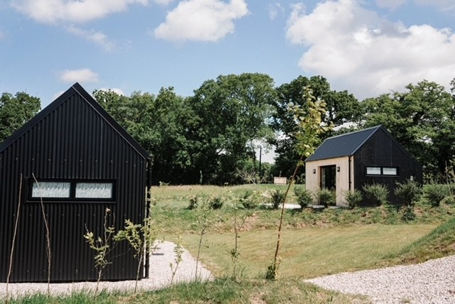 Sanctaury Sleeps Black PVC Corrugated Cladding Sheets.
