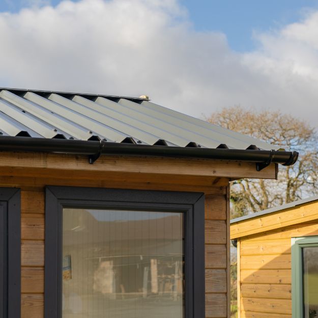 Timber structure showcasing Cladco box profile steel roofing sheets by Shields Buildings