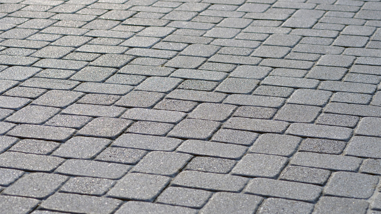 Concrete can be poured and used to recreate the look of individual stone tiles