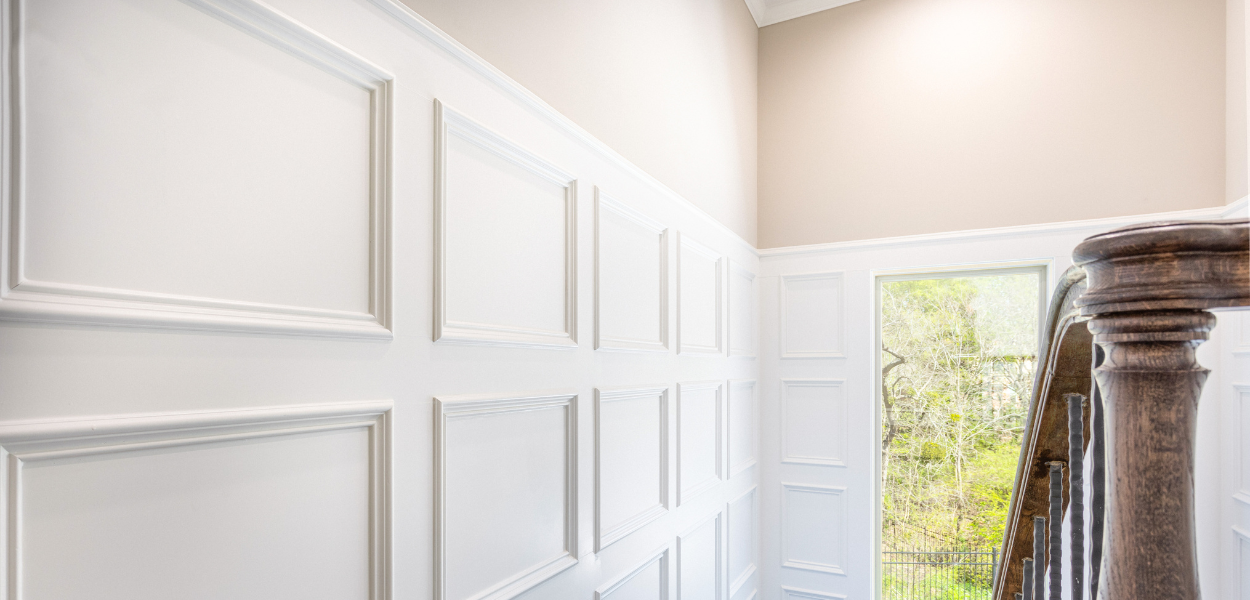 Raised wall panels using wood slats Raised wall panels using wood slats