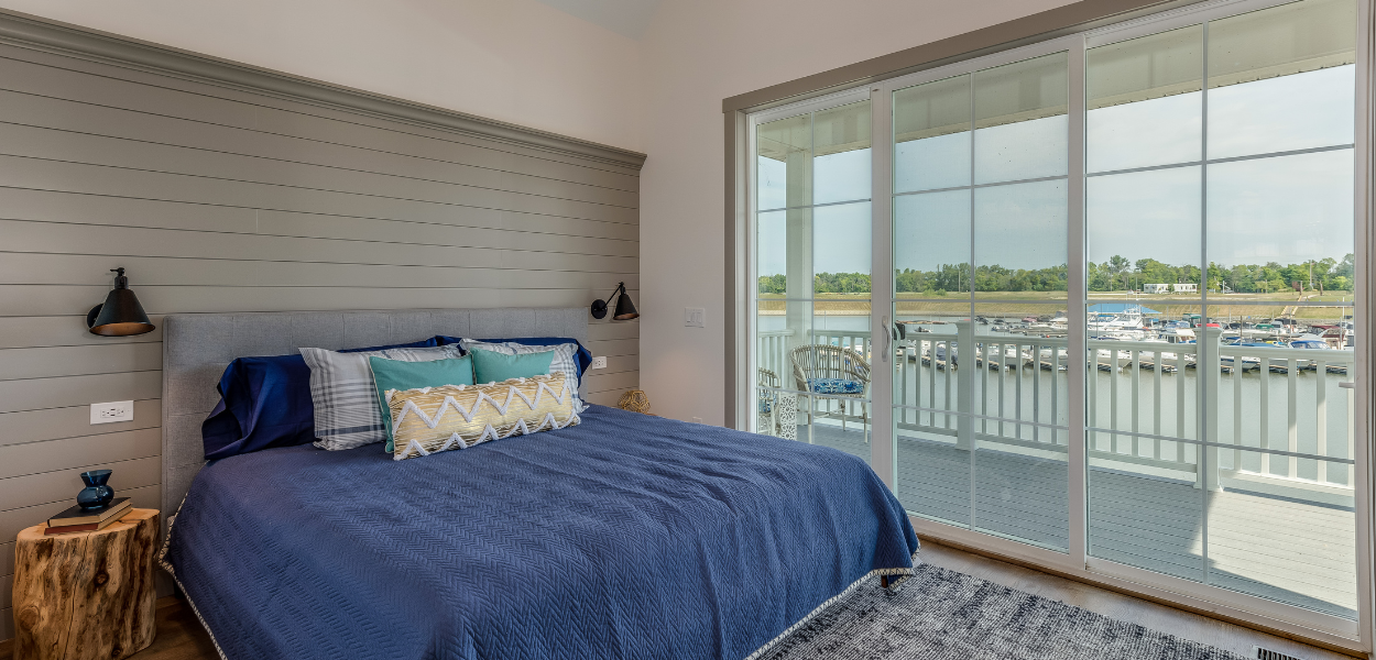 Floor to ceiling: shiplap wall panelling installed as a feature wall/headboard in this coastal bedroom Floor to ceiling: shiplap wall panelling installed as a feature wall/headboard in this coastal bedroom